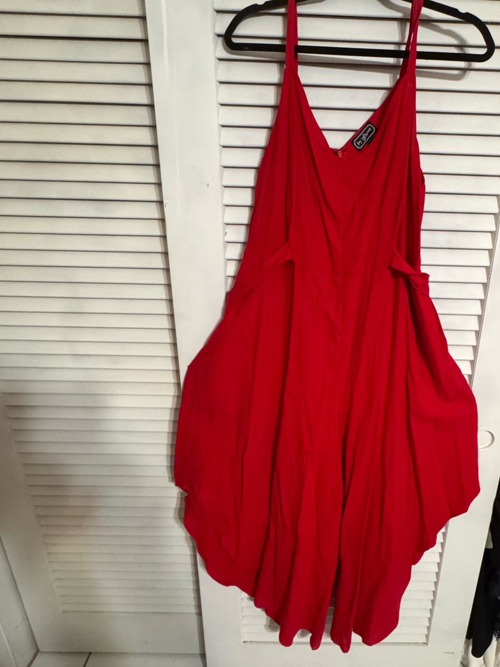 Sleeveless Red V-Neck Flowing Jumpsuit